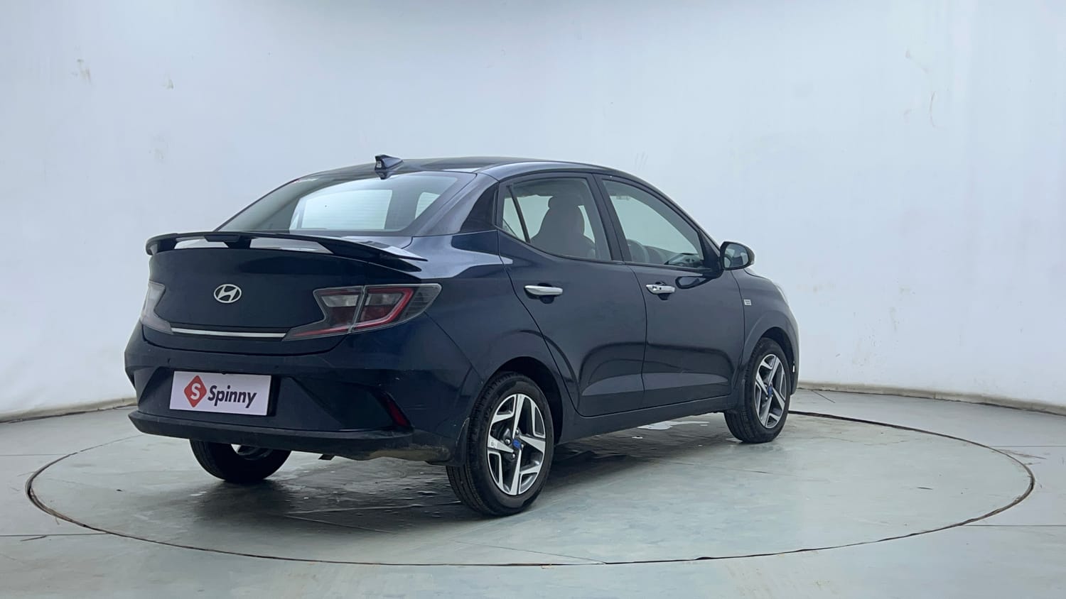 Used 2025 Hyundai Aura SX Plus 1.2 AMT Petrol Petrol Automatic exterior RIGHT REAR CORNER VIEW