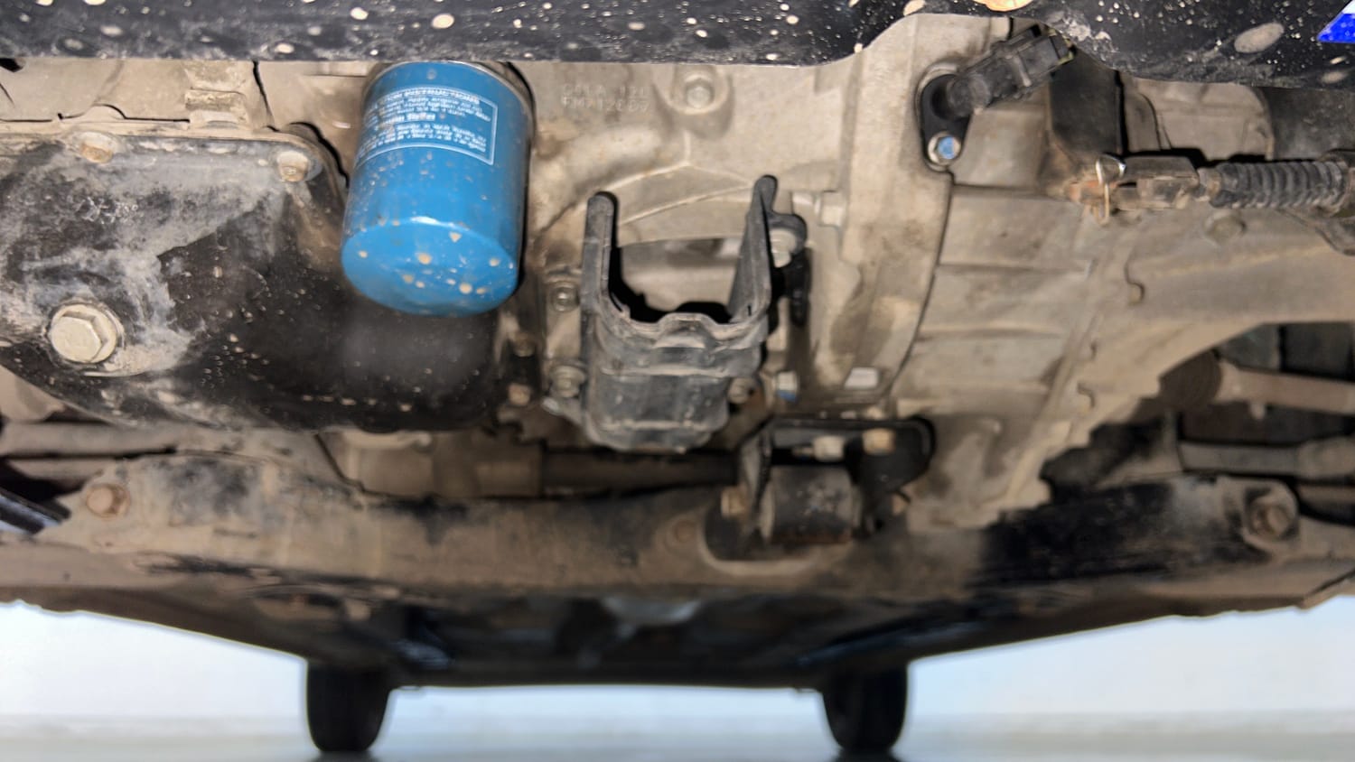 Used 2015 Hyundai Grand i10 Sportz 1.2 Kappa VTVT Petrol Manual extra FRONT LEFT UNDERBODY VIEW