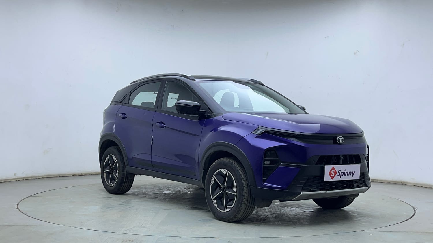 Used 2024 Tata Nexon Fearless Plus S Purple 1.2 Revotron Petrol 7DCA Dual Tone Petrol Automatic exterior RIGHT FRONT CORNER VIEW