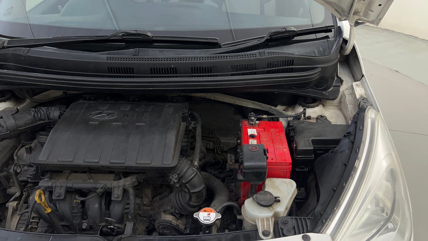 Used 2016 Hyundai Grand i10 Sportz 1.2 Kappa VTVT Petrol Manual engine ENGINE LEFT SIDE HINGE & APRON VIEW