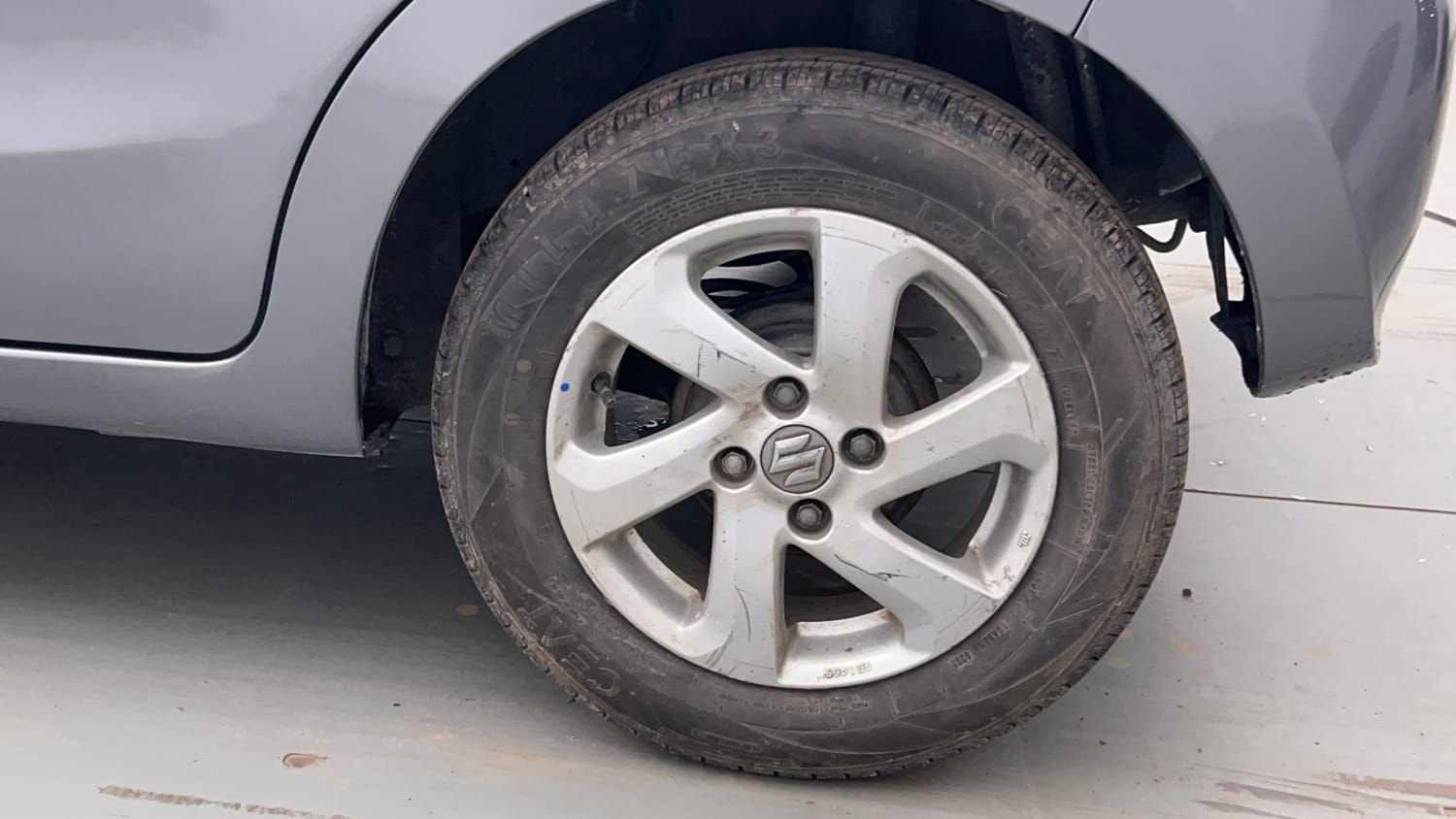 Used 2015 Maruti Suzuki Celerio ZXi Petrol Manual tyres LEFT REAR TYRE RIM VIEW