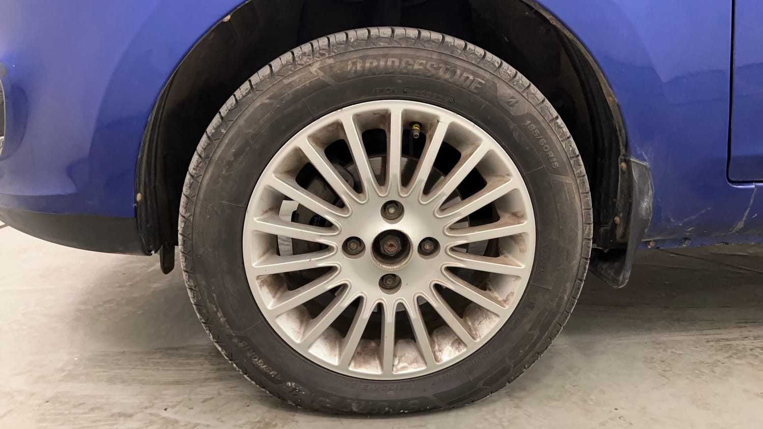 Used 2015 Tata Zest XT Petrol Petrol Manual tyres LEFT FRONT TYRE RIM VIEW