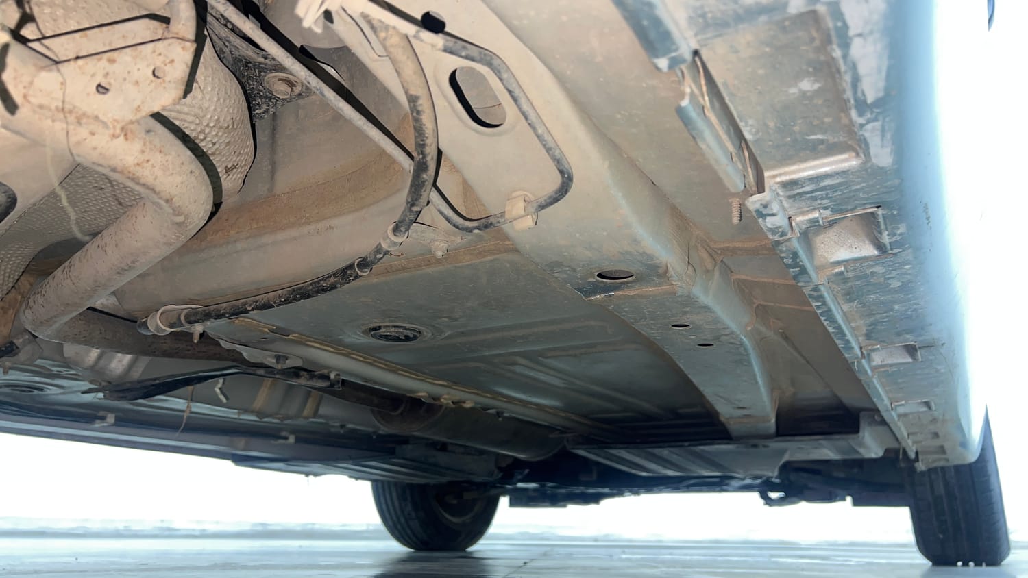 Used 2024 Maruti Suzuki Baleno Sigma MT Petrol Manual extra REAR RIGHT UNDERBODY VIEW