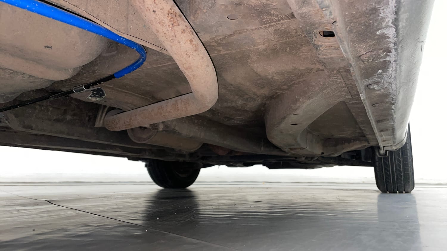 Used 2015 Honda Brio E MT Petrol Manual extra REAR RIGHT UNDERBODY VIEW