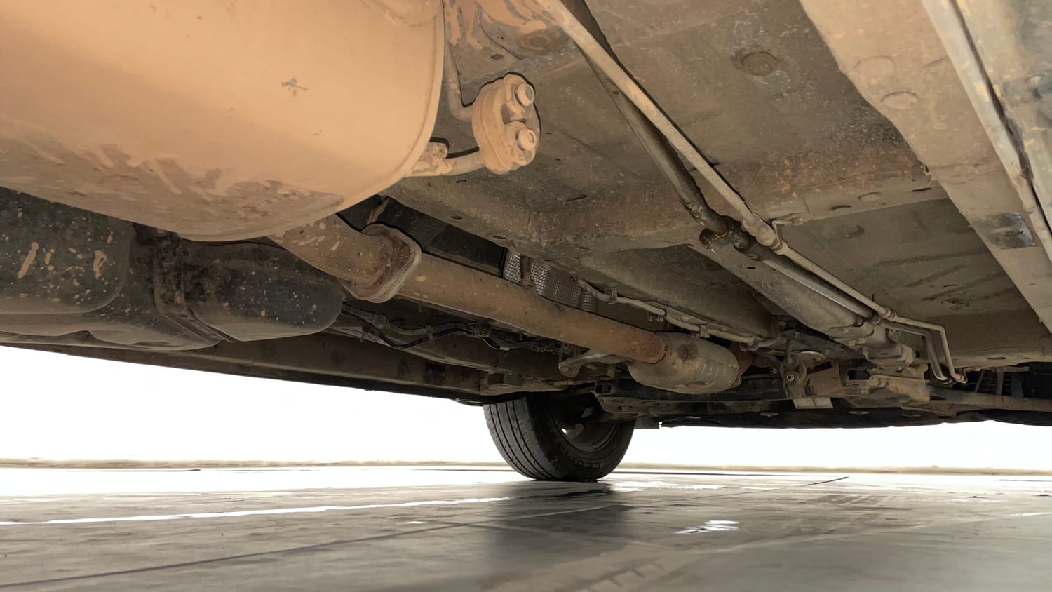 Used 2024 Mahindra XUV700 AX7 Luxury Pack Diesel MT 7 STR Diesel Manual extra REAR RIGHT UNDERBODY VIEW