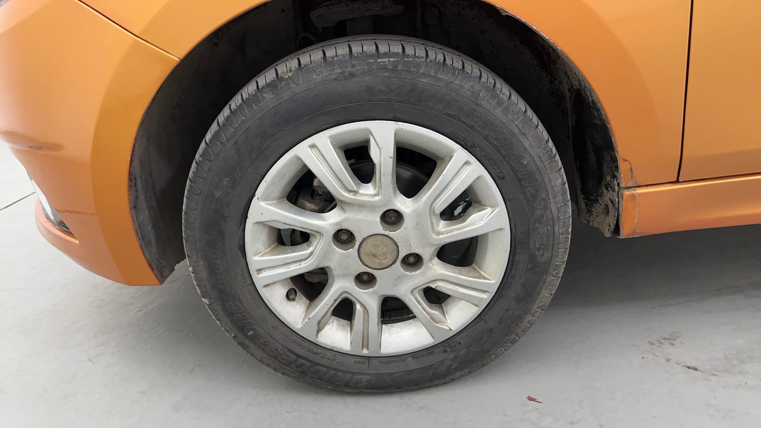 Used 2016 Tata Tiago Revotron XZ Petrol Manual tyres LEFT FRONT TYRE RIM VIEW