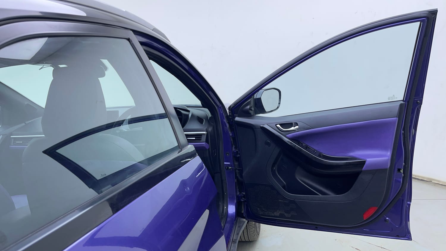 Used 2024 Tata Nexon Fearless Plus S Purple 1.2 Revotron Petrol 7DCA Dual Tone Petrol Automatic interior RIGHT FRONT DOOR OPEN VIEW