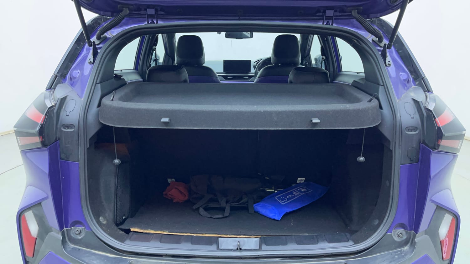 Used 2024 Tata Nexon Fearless Plus S Purple 1.2 Revotron Petrol 7DCA Dual Tone Petrol Automatic interior DICKY INSIDE VIEW