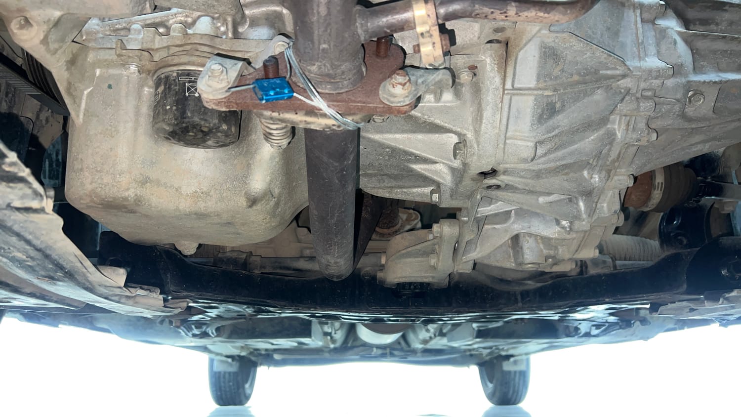 Used 2024 Maruti Suzuki Baleno Sigma MT Petrol Manual extra FRONT LEFT UNDERBODY VIEW
