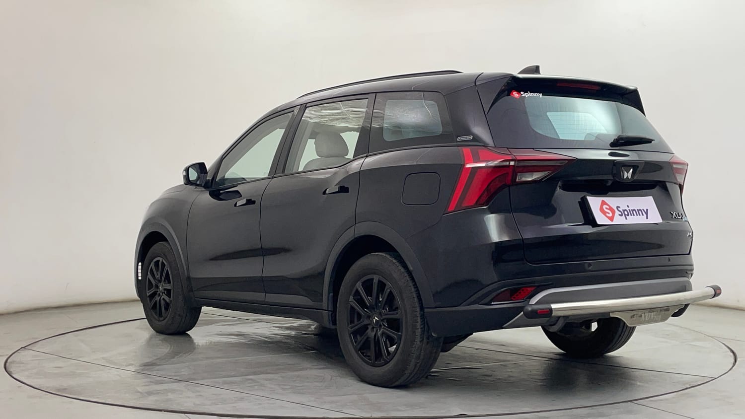 Used 2024 Mahindra XUV700 AX7 Luxury Pack Diesel MT 7 STR Diesel Manual exterior LEFT REAR CORNER VIEW