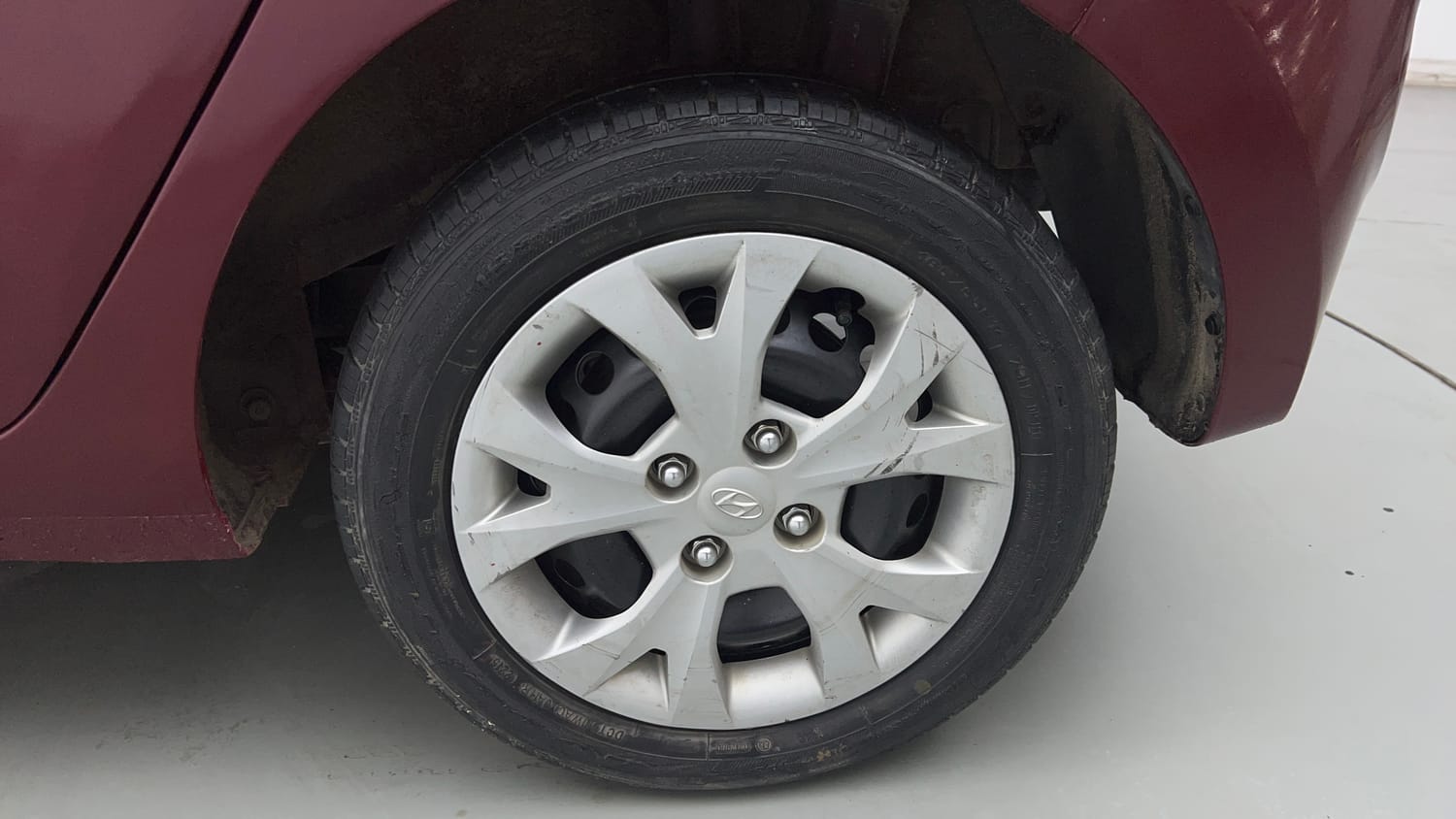Used 2015 Hyundai Grand i10 Sportz 1.2 Kappa VTVT Petrol Manual tyres LEFT REAR TYRE RIM VIEW