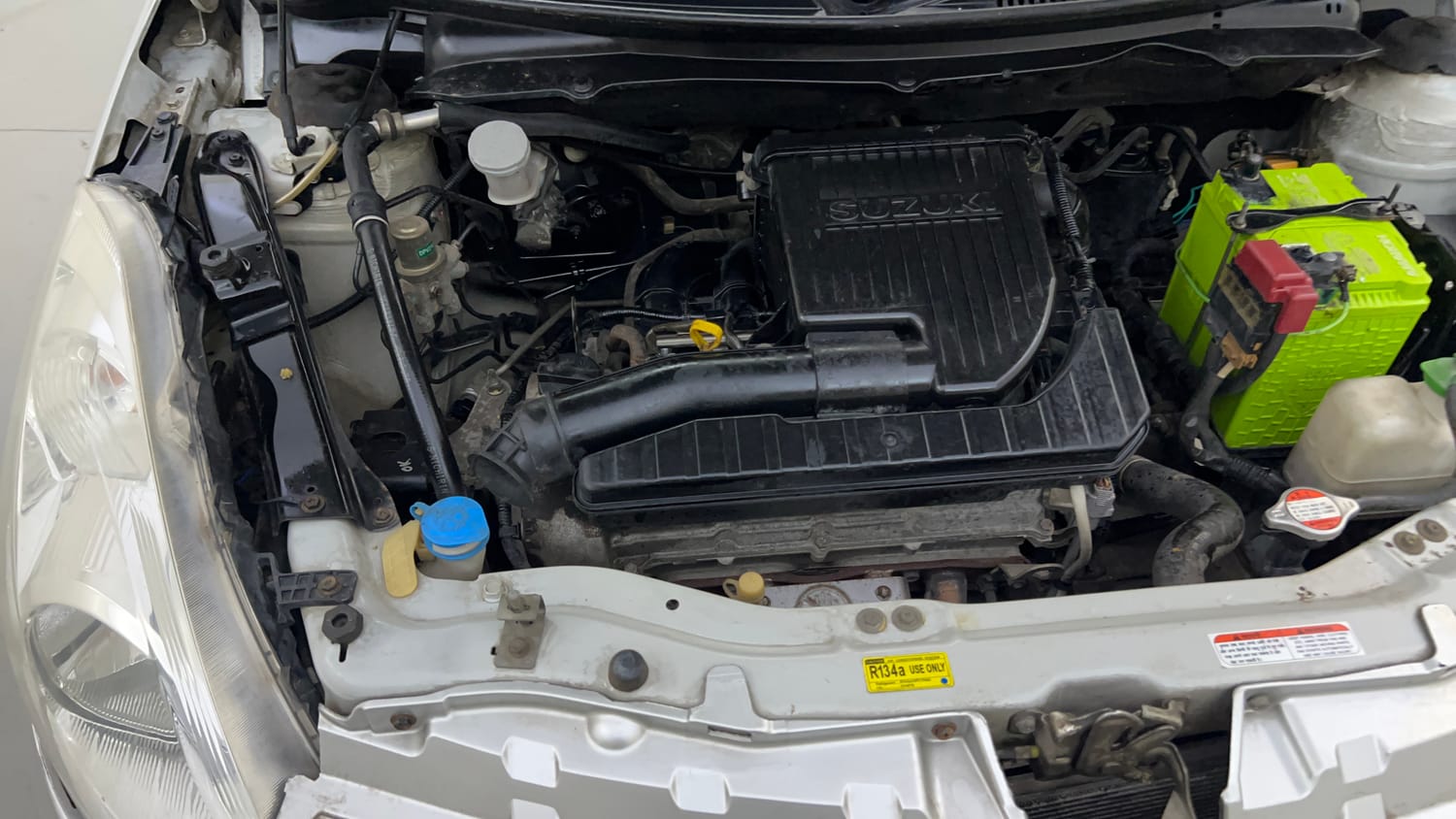 Used 2012 Maruti Suzuki Swift Dzire VXI Petrol Manual engine ENGINE RIGHT SIDE VIEW