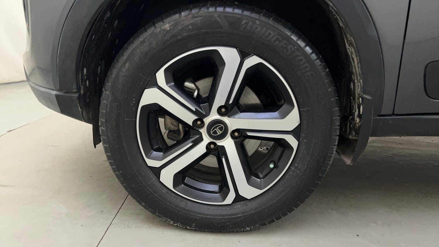 Used 2023 Tata Nexon XZ Plus Petrol Manual tyres LEFT FRONT TYRE RIM VIEW