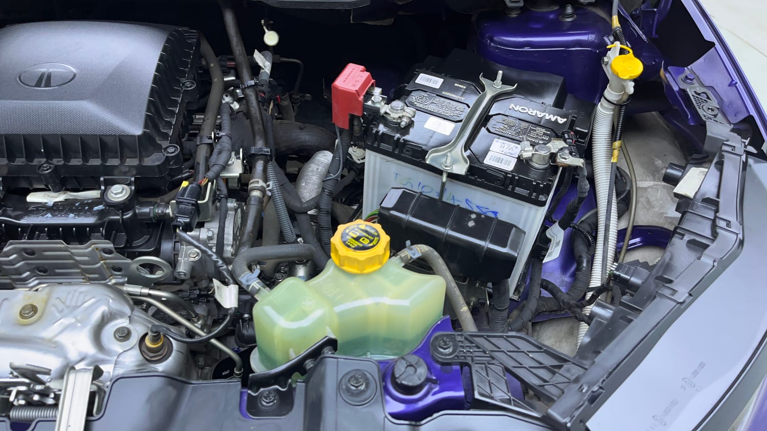 Used 2024 Tata Nexon Fearless Plus S Purple 1.2 Revotron Petrol 7DCA Dual Tone Petrol Automatic engine ENGINE LEFT SIDE VIEW