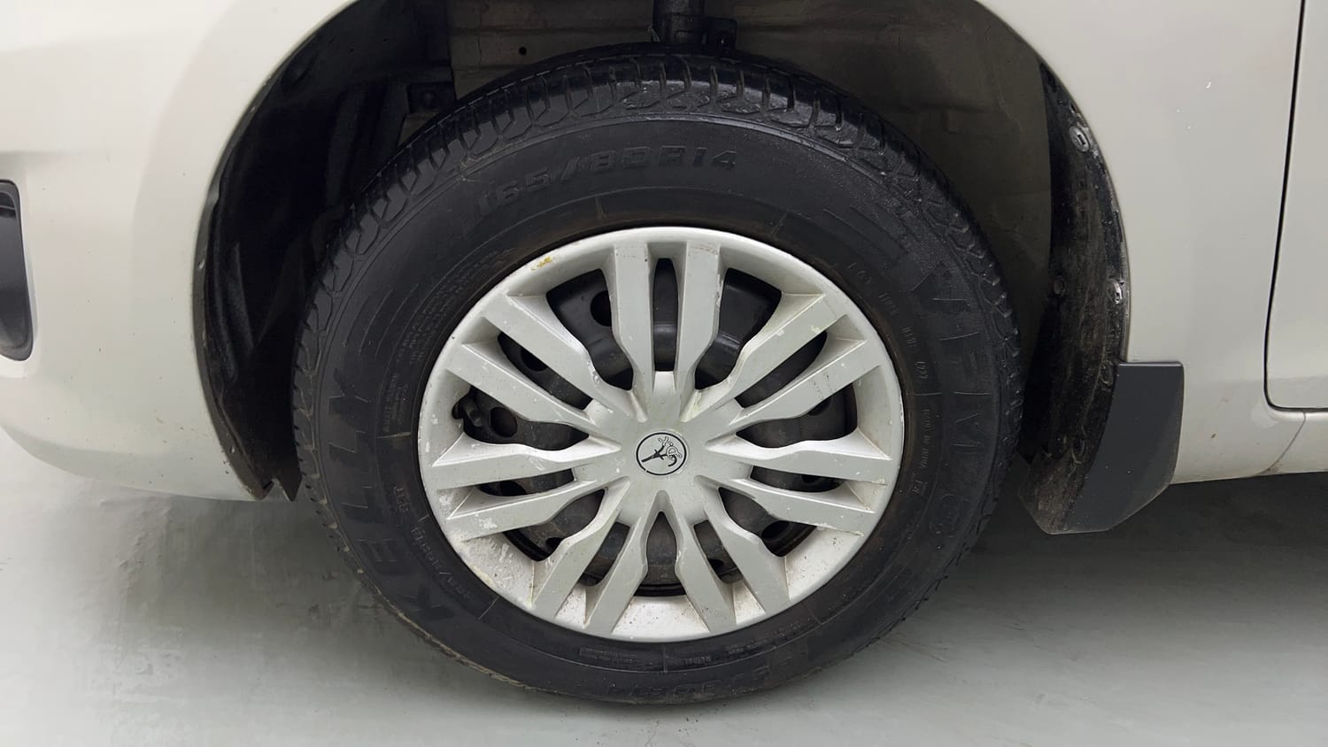 Used 2013 Maruti Suzuki Swift Dzire VXI Petrol Manual tyres LEFT FRONT TYRE RIM VIEW