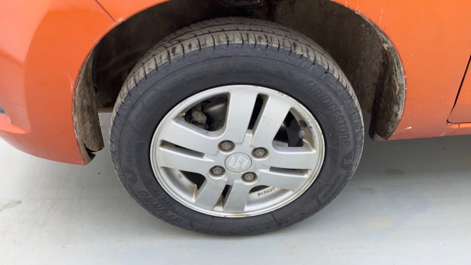 Used 2015 Maruti Suzuki Alto K10 VXi Petrol Manual tyres LEFT FRONT TYRE RIM VIEW