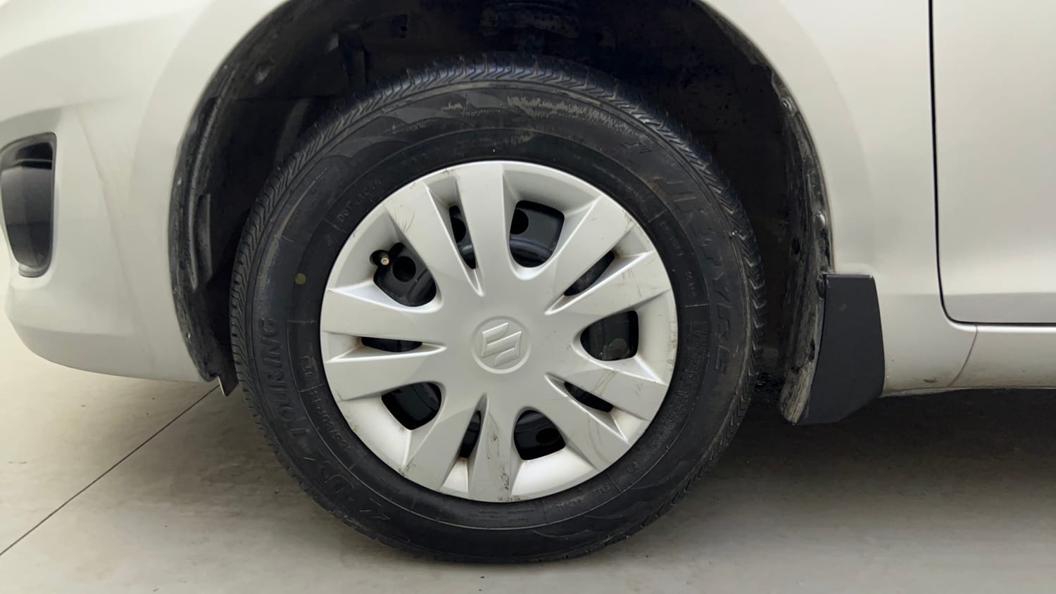Used 2012 Maruti Suzuki Swift Dzire VXI Petrol Manual tyres LEFT FRONT TYRE RIM VIEW