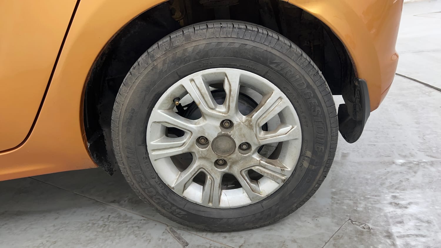 Used 2016 Tata Tiago Revotron XZ Petrol Manual tyres LEFT REAR TYRE RIM VIEW