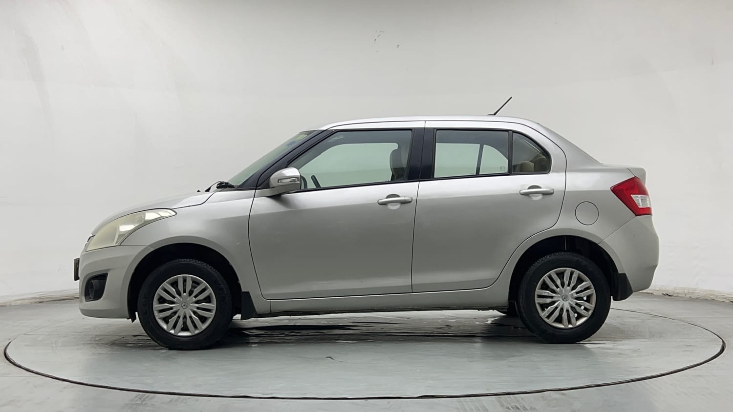 Used 2013 Maruti Suzuki Swift Dzire VXI Petrol Manual exterior LEFT SIDE VIEW