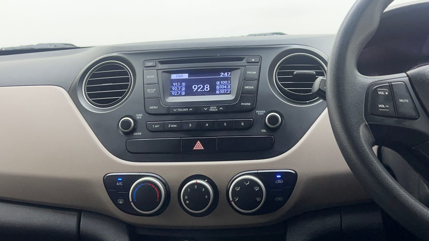 Used 2016 Hyundai Grand i10 Sportz 1.2 Kappa VTVT Petrol Manual interior MUSIC SYSTEM & AC CONTROL VIEW