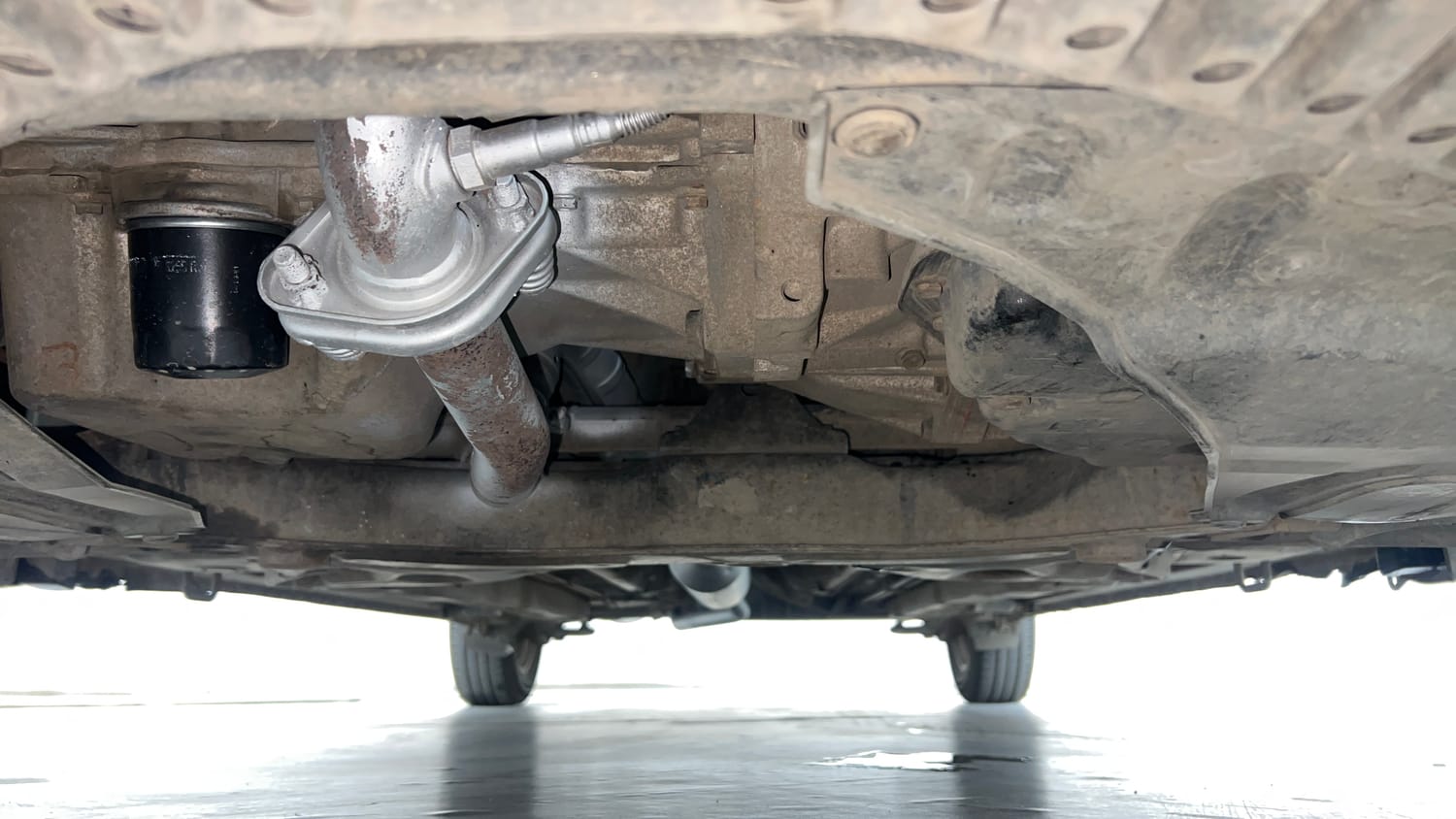 Used 2015 Maruti Suzuki Ciaz ZXi  AT Petrol Automatic extra FRONT LEFT UNDERBODY VIEW