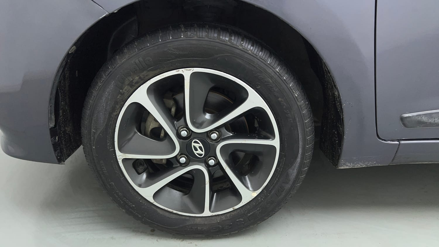Used 2018 Hyundai Grand i10 Sportz AT 1.2 Kappa VTVT Petrol Automatic tyres LEFT FRONT TYRE RIM VIEW