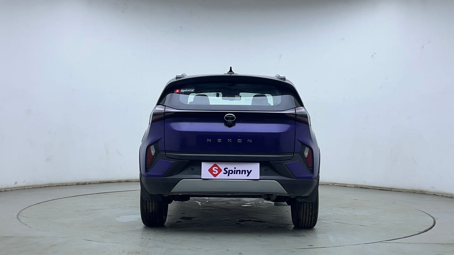 Used 2024 Tata Nexon Fearless Plus S Purple 1.2 Revotron Petrol 7DCA Dual Tone Petrol Automatic exterior BACK VIEW