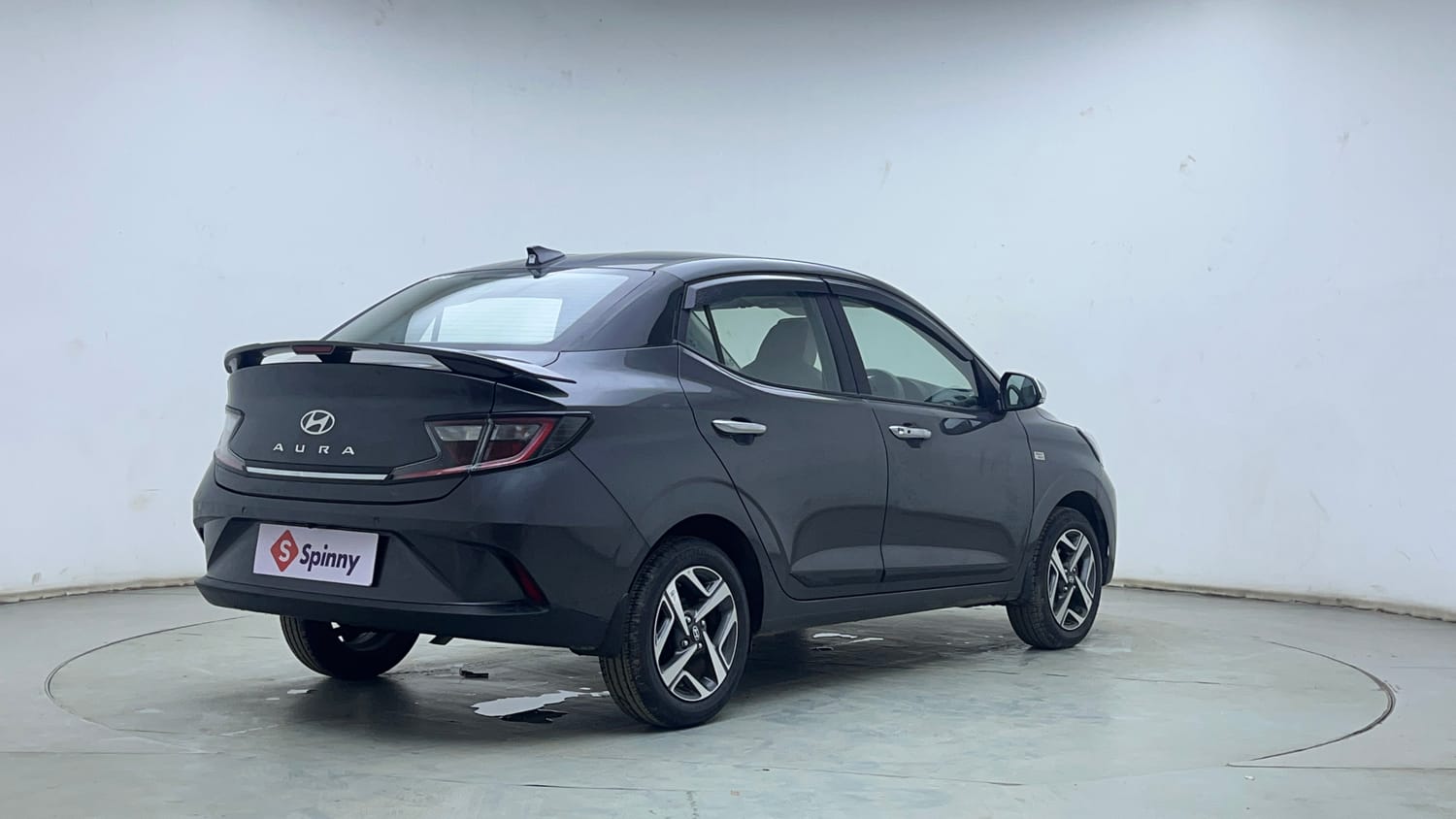 Used 2026 Hyundai Aura SX Plus 1.2 AMT Petrol Petrol Automatic exterior RIGHT REAR CORNER VIEW