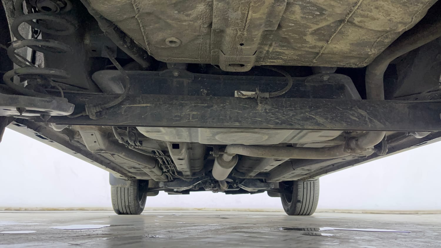 Used 2024 Tata Nexon Fearless Plus S Purple 1.2 Revotron Petrol 7DCA Dual Tone Petrol Automatic extra REAR UNDERBODY VIEW (TAKEN FROM REAR)