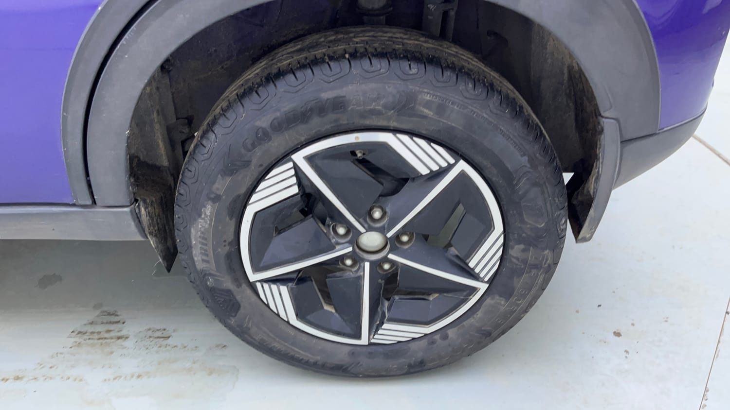 Used 2024 Tata Nexon Fearless Plus S Purple 1.2 Revotron Petrol 7DCA Dual Tone Petrol Automatic tyres LEFT REAR TYRE RIM VIEW