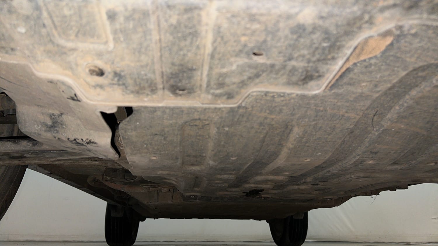 Used 2023 Tata Nexon EV XZ Plus LUX Electric Automatic extra FRONT LEFT UNDERBODY VIEW