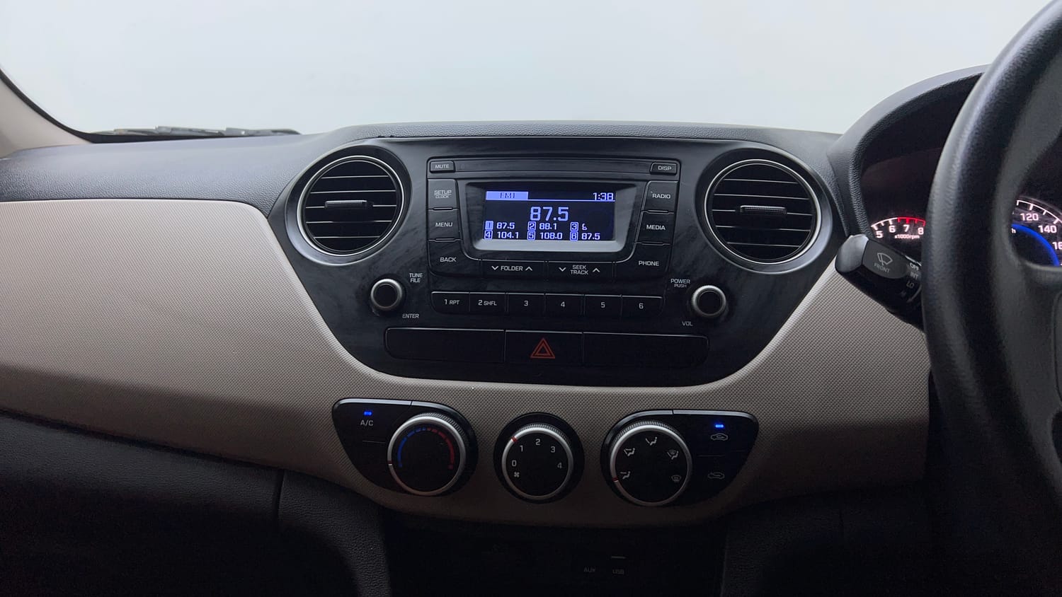 Used 2018 Hyundai Grand i10 Magna 1.2 Kappa VTVT Petrol Manual interior MUSIC SYSTEM & AC CONTROL VIEW