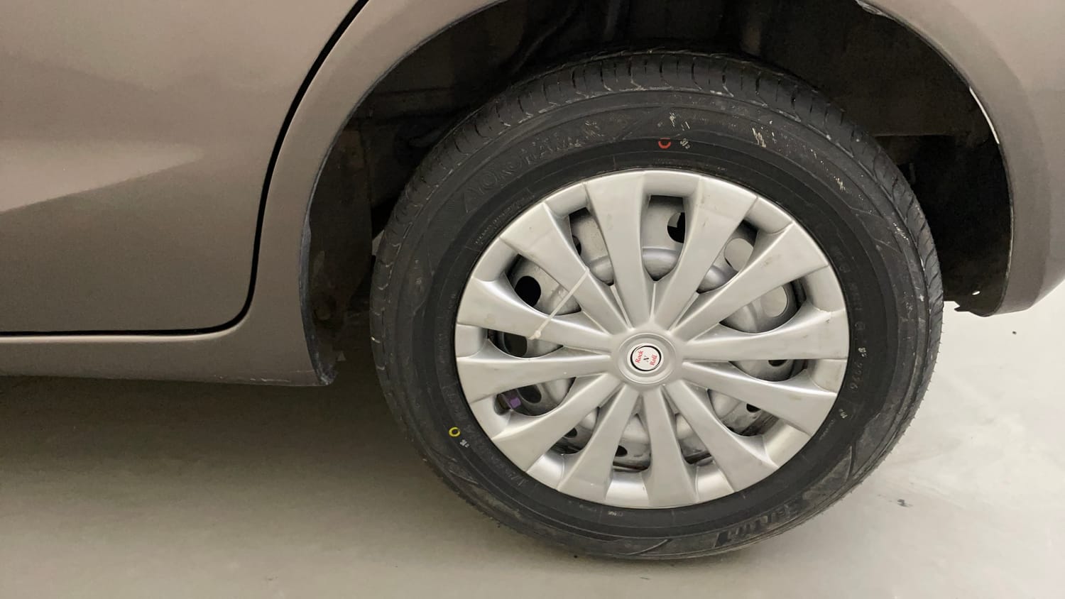 Used 2015 Honda Brio E MT Petrol Manual tyres LEFT REAR TYRE RIM VIEW
