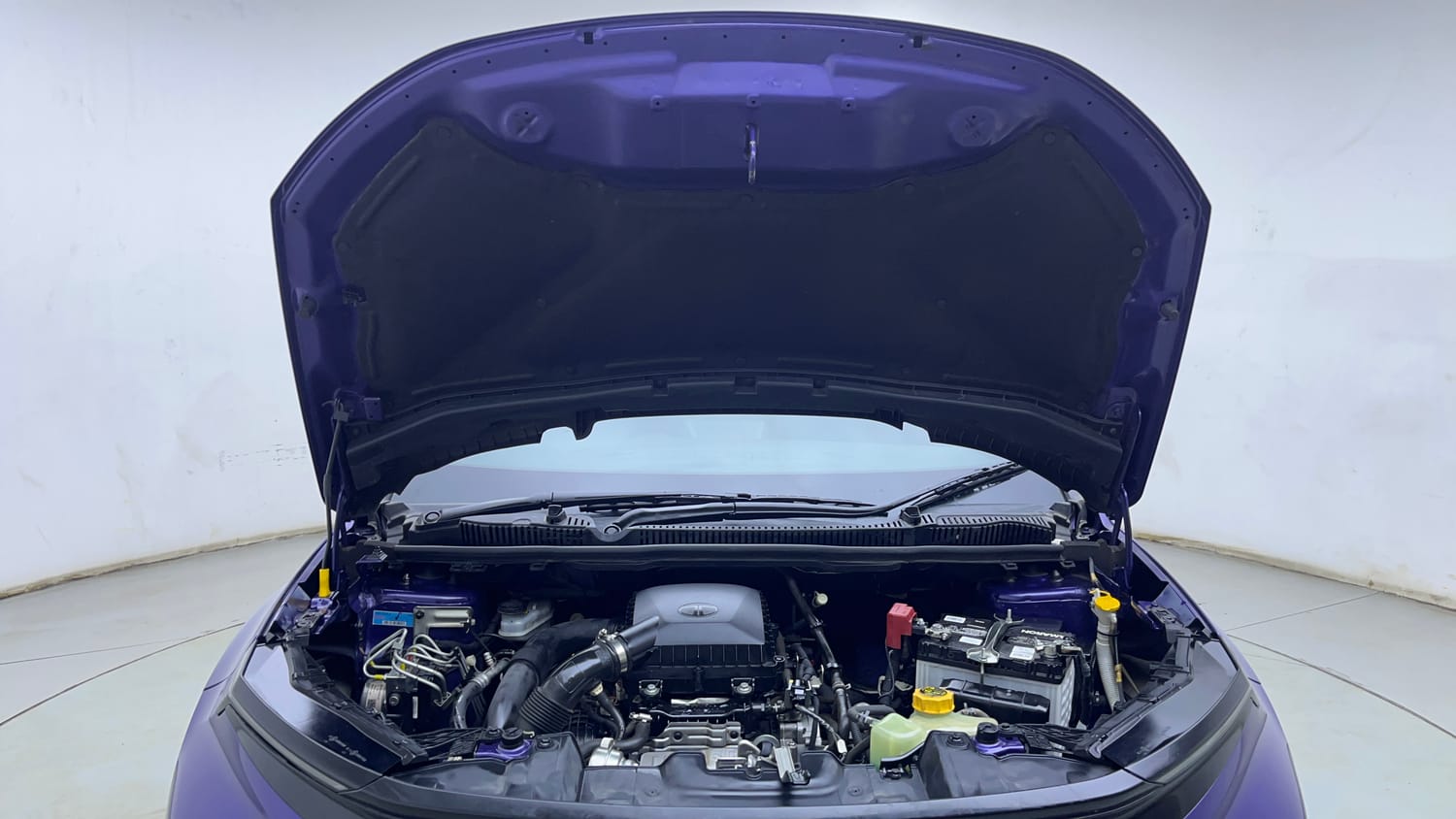 Used 2024 Tata Nexon Fearless Plus S Purple 1.2 Revotron Petrol 7DCA Dual Tone Petrol Automatic engine ENGINE & BONNET OPEN FRONT VIEW