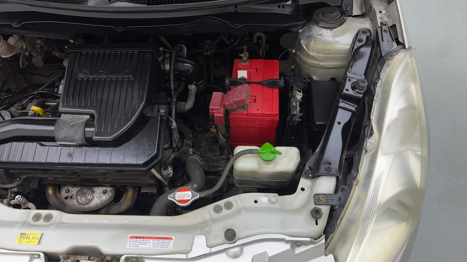Used 2013 Maruti Suzuki Swift Dzire VXI Petrol Manual engine ENGINE LEFT SIDE VIEW