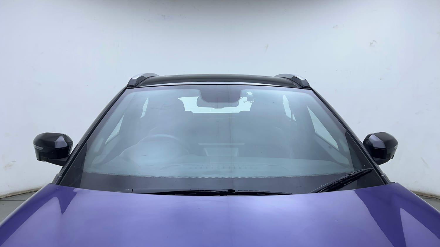Used 2024 Tata Nexon Fearless Plus S Purple 1.2 Revotron Petrol 7DCA Dual Tone Petrol Automatic exterior FRONT WINDSHIELD VIEW