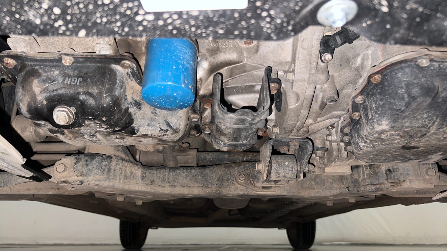 Used 2014 Hyundai Xcent SX AT 1.2 (O) Petrol Automatic extra FRONT LEFT UNDERBODY VIEW