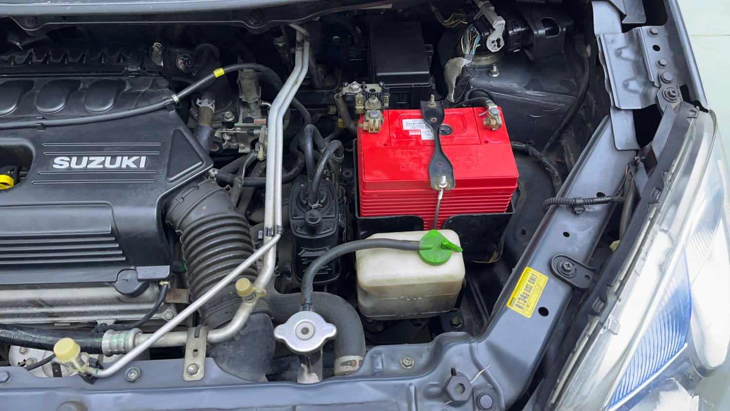 Used 2012 Maruti Suzuki Wagon R 1.0 VXi Petrol Manual engine ENGINE LEFT SIDE VIEW