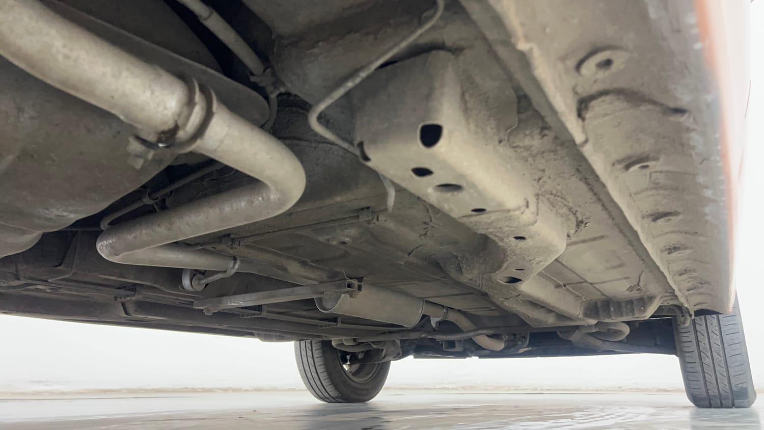Used 2016 Tata Tiago Revotron XZ Petrol Manual extra REAR RIGHT UNDERBODY VIEW