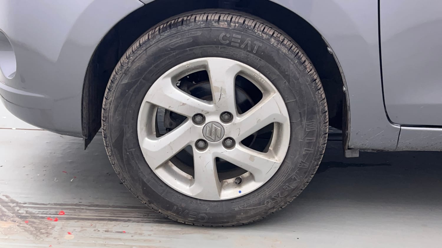 Used 2015 Maruti Suzuki Celerio ZXi Petrol Manual tyres LEFT FRONT TYRE RIM VIEW