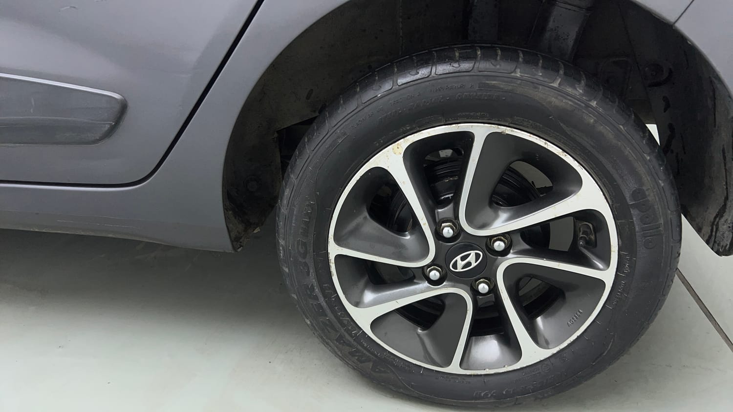 Used 2018 Hyundai Grand i10 Sportz AT 1.2 Kappa VTVT Petrol Automatic tyres LEFT REAR TYRE RIM VIEW