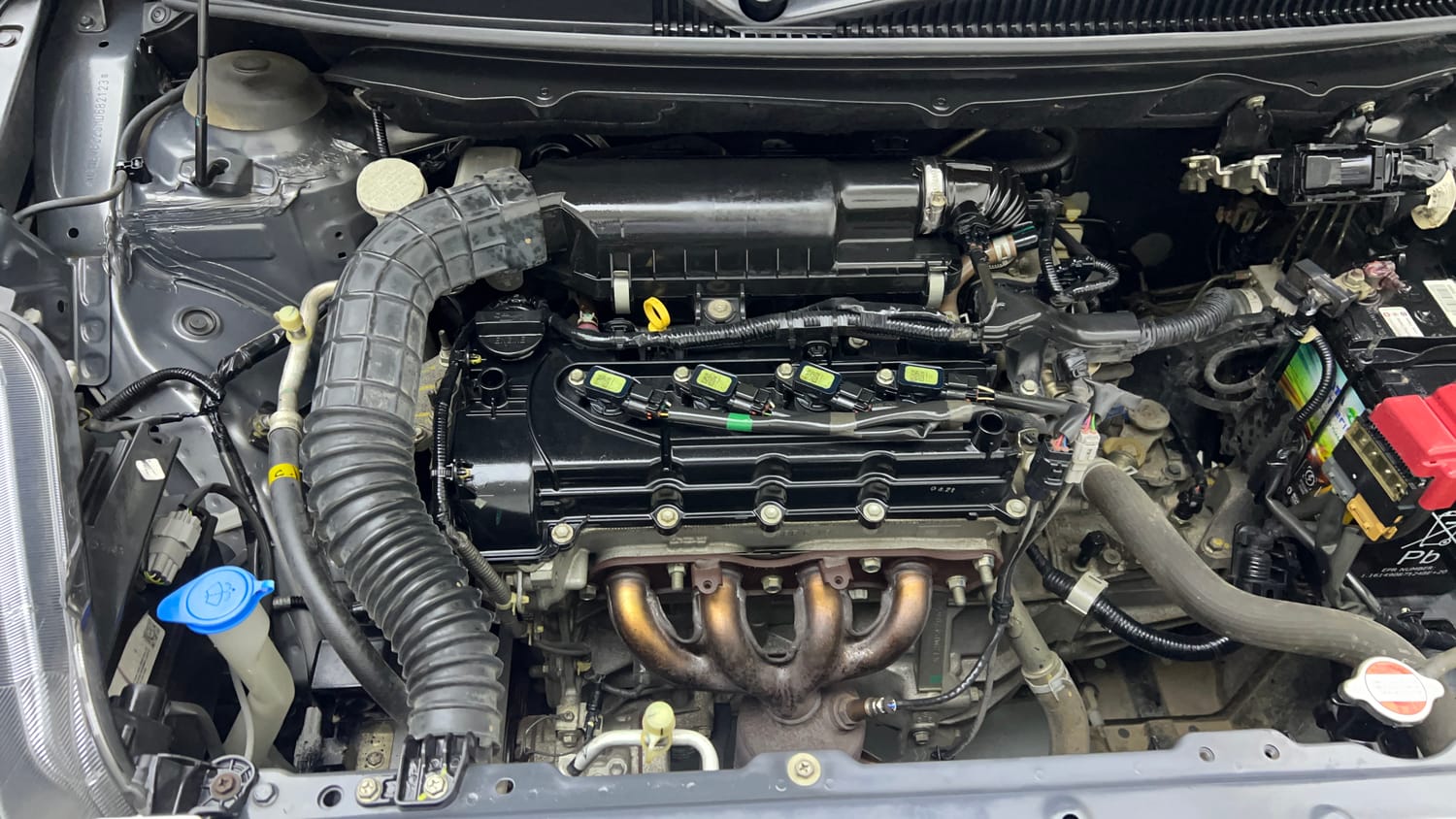 Used 2021 Maruti Suzuki Baleno Zeta Petrol Manual engine ENGINE RIGHT SIDE VIEW