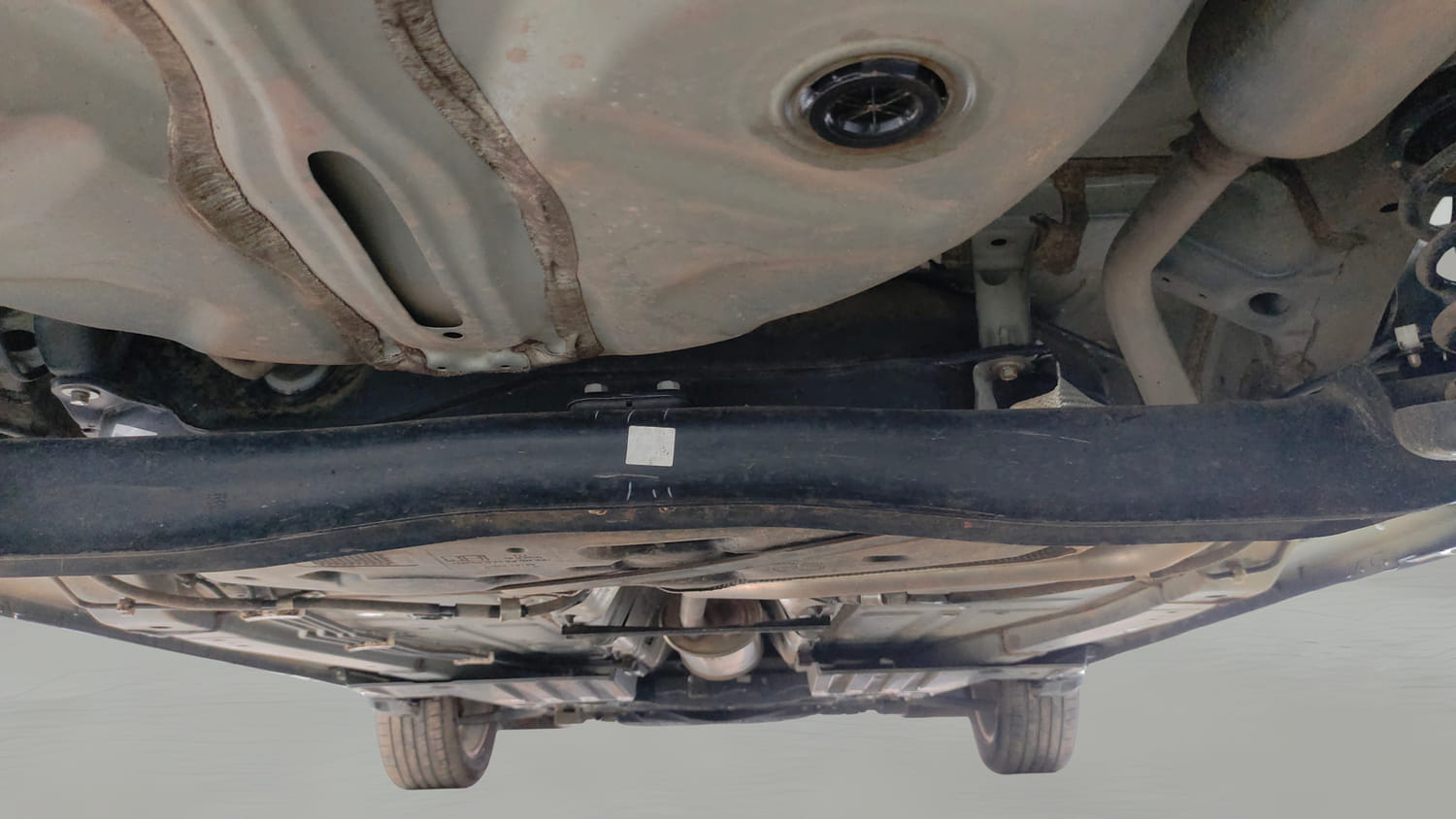 Used 2025 Toyota Glanza V Petrol Manual extra REAR UNDERBODY VIEW (TAKEN FROM REAR)