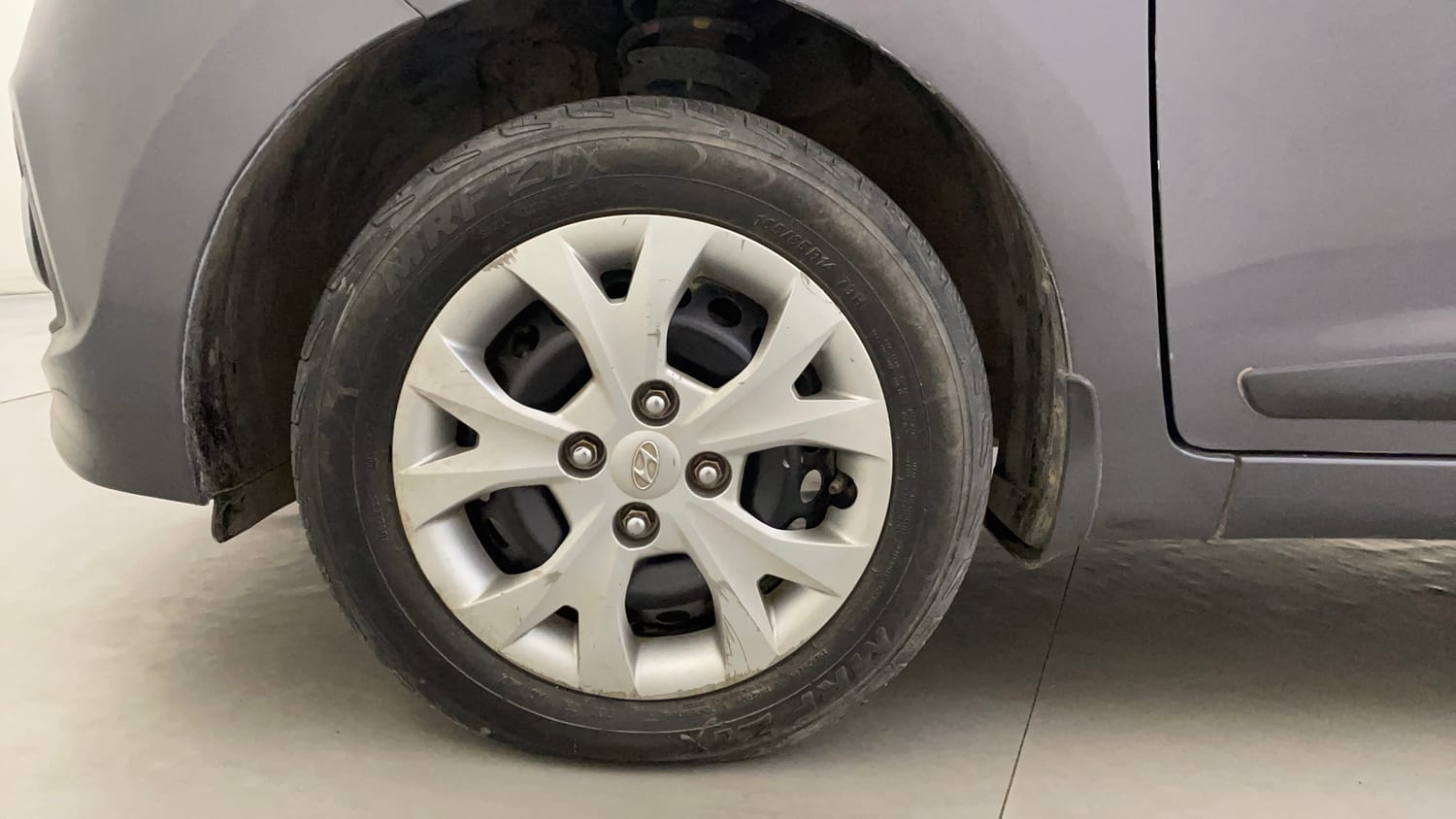 Used 2016 Hyundai Grand i10 Sportz 1.2 Kappa VTVT Petrol Manual tyres LEFT FRONT TYRE RIM VIEW