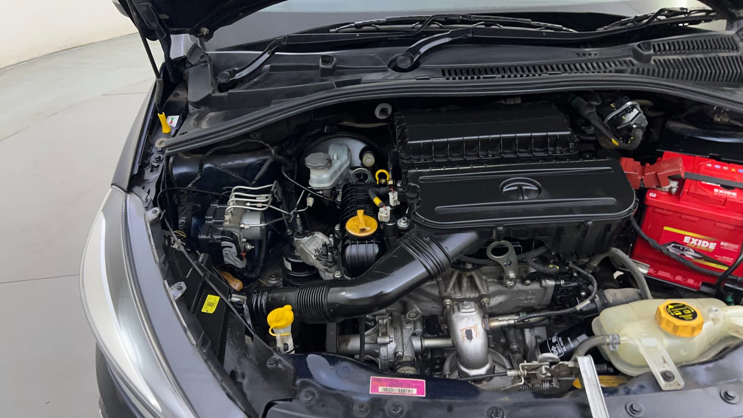 Used 2022 Tata Tigor XZA Plus Petrol Automatic engine ENGINE RIGHT SIDE HINGE & APRON VIEW