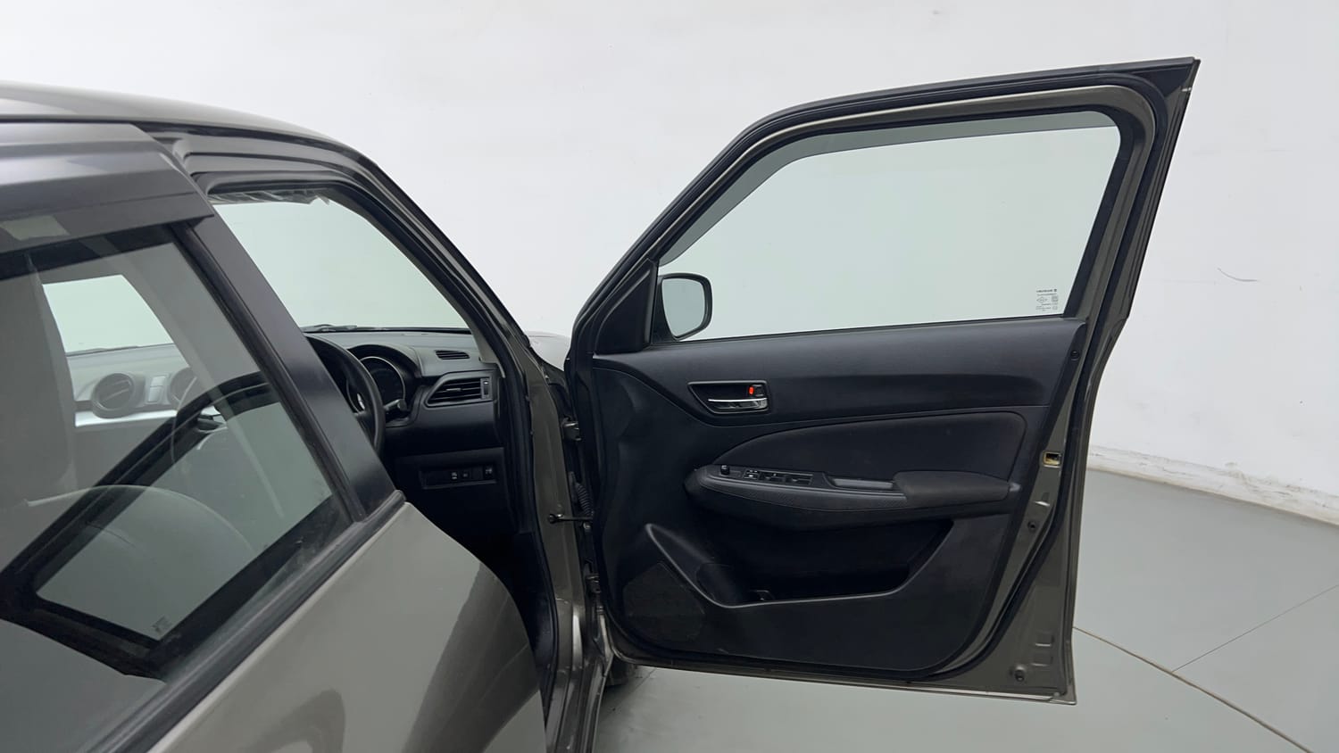 Used 2021 Maruti Suzuki Swift VXi Petrol Manual interior RIGHT FRONT DOOR OPEN VIEW