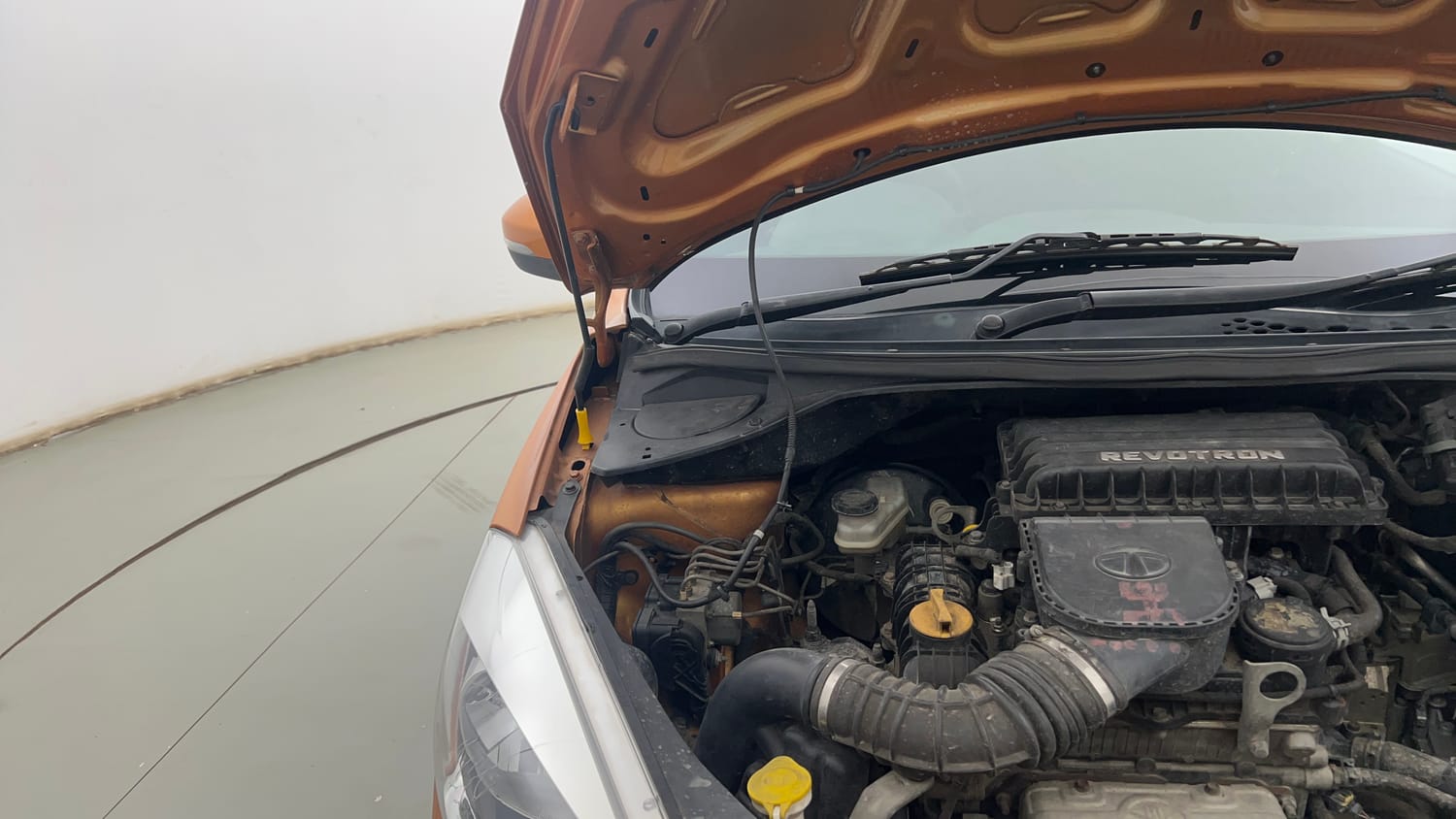 Used 2017 Tata Tiago Revotron XZA Petrol Automatic engine ENGINE RIGHT SIDE HINGE & APRON VIEW