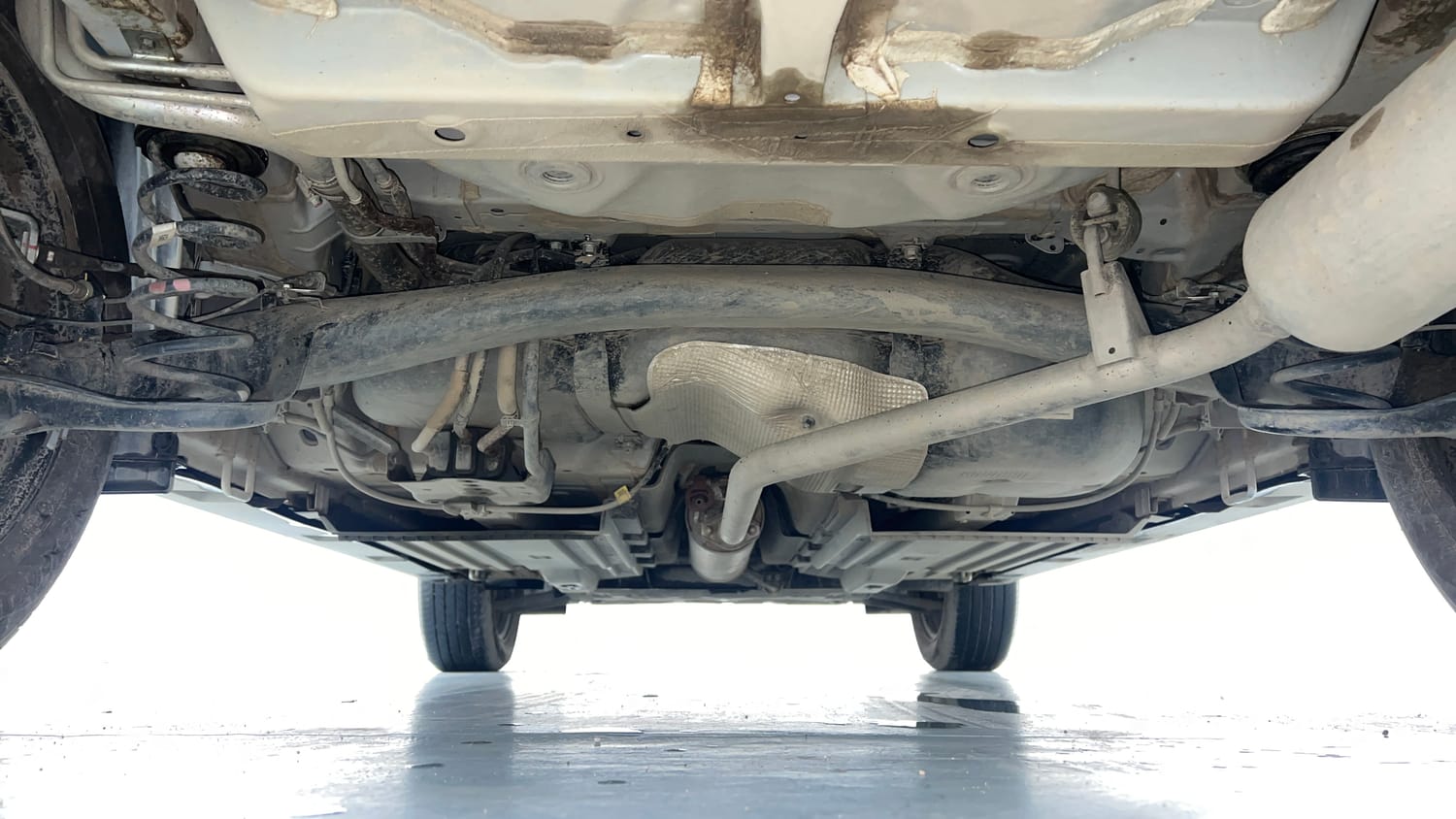 Used 2026 Maruti Suzuki Victoris VXI MT 2W Petrol Manual extra REAR UNDERBODY VIEW (TAKEN FROM REAR)