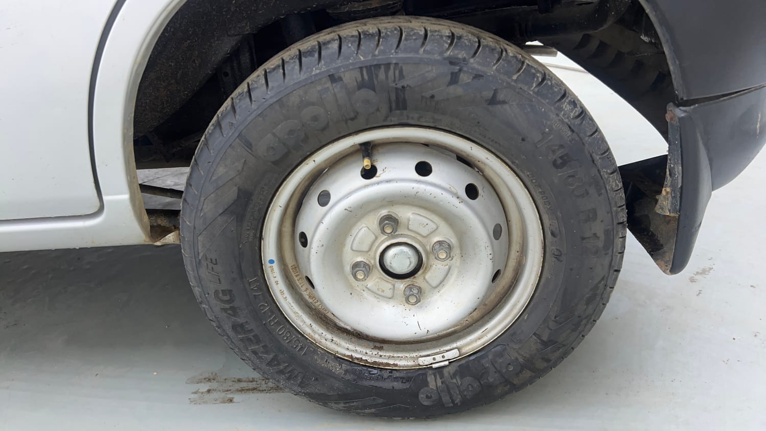 Used 2012 Maruti Suzuki Alto LXi BS-IV Petrol Manual tyres LEFT REAR TYRE RIM VIEW