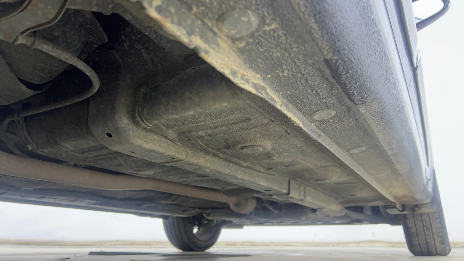 Used 2023 Hyundai Aura SX 1.2 CNG Cng Manual extra REAR RIGHT UNDERBODY VIEW
